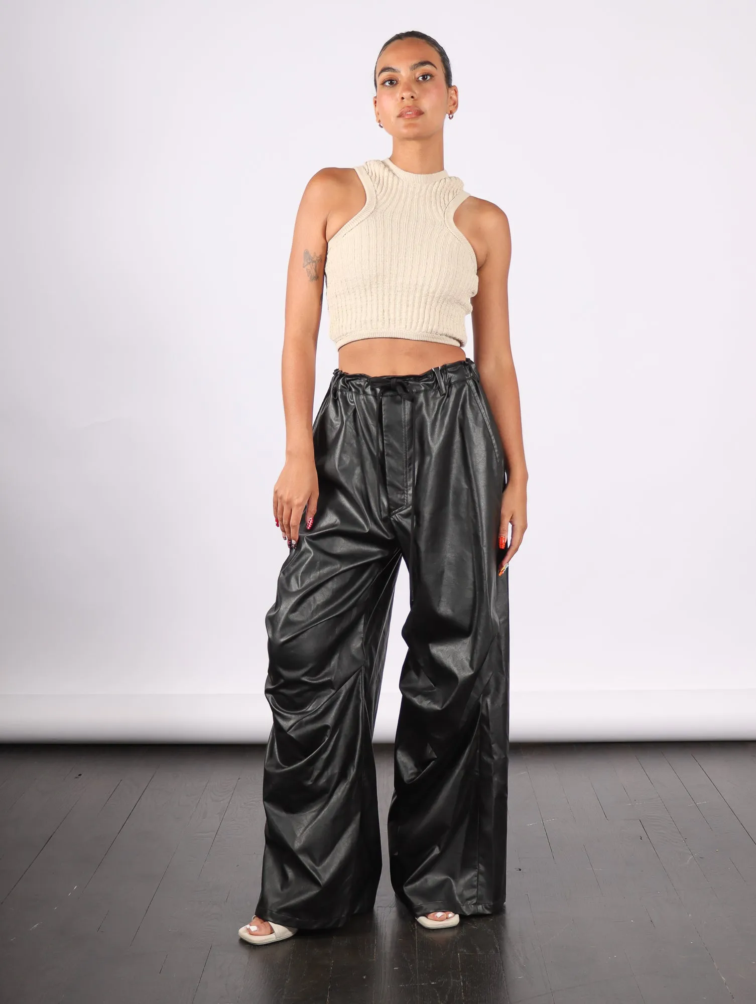Pants in Black Faux Leather by MM6 Maison Margiela