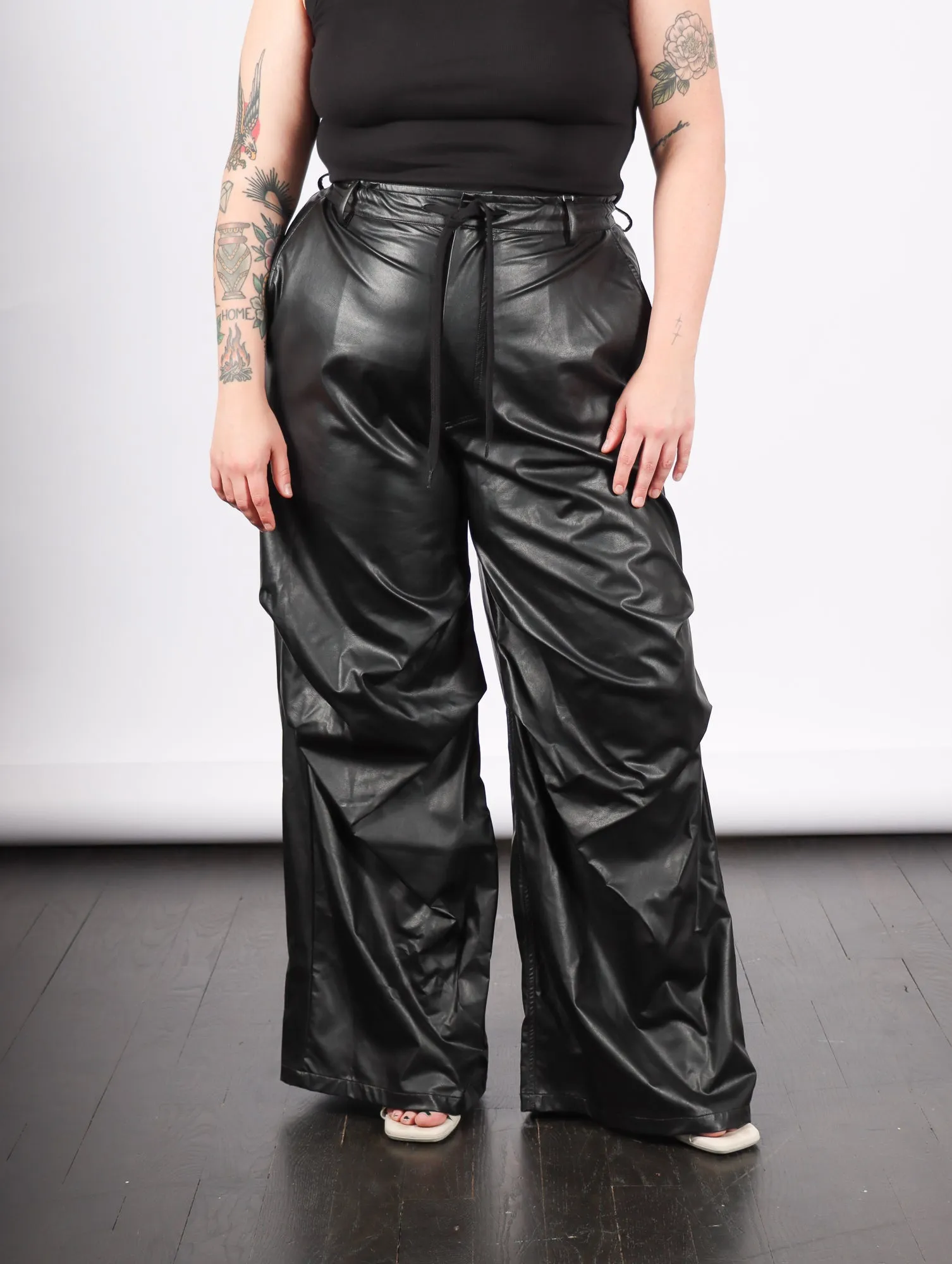 Pants in Black Faux Leather by MM6 Maison Margiela